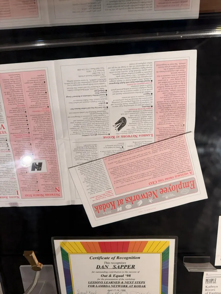 An "Employee Networks at Kodak" newsletter featuring the Lambda Network, above an Out & Equal '98 certificate of recognition